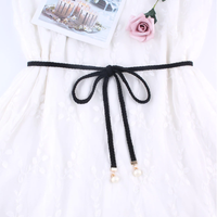 Ceinture macramé noire à perles
