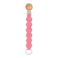attache tétine ronde macramé rose