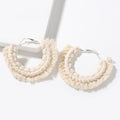 Boucle d'oreille bohème macramé beige