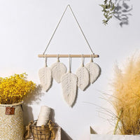 Décoration murale plume macramé